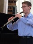 Dr Christopher Wiley (oboe) performing in Guildford Cathedral